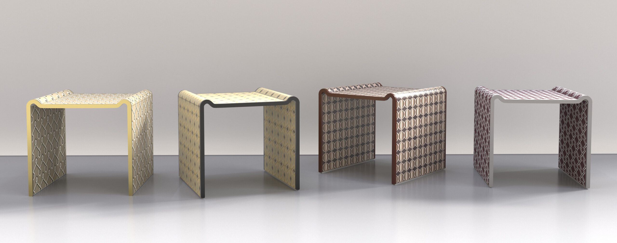 Four small U-shaped sidetables with different geometric patterns and colors, designed by Annette Wernick for Cadenza Visioni.