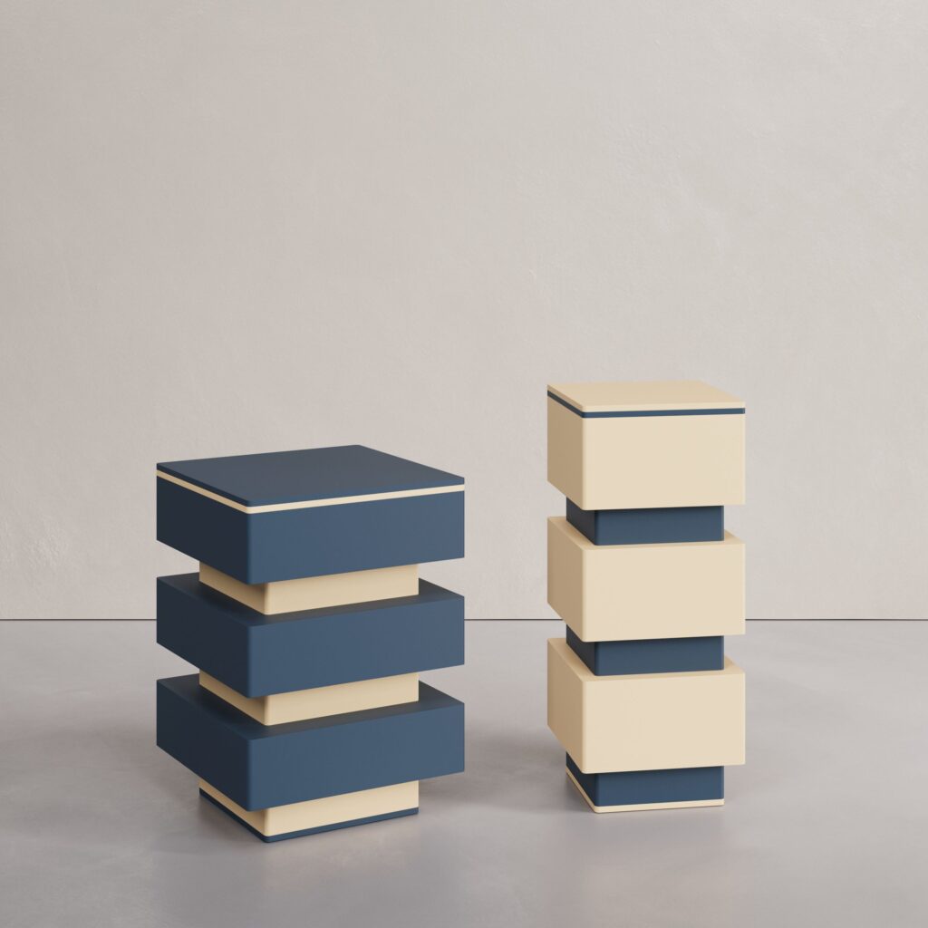 The Brut Nature Twin-Tables in lacquered MDF from the In the Glass collection by Cadenza Visioni by Annette Wernick, showcasing a deep blue and cream beige architectural block design.